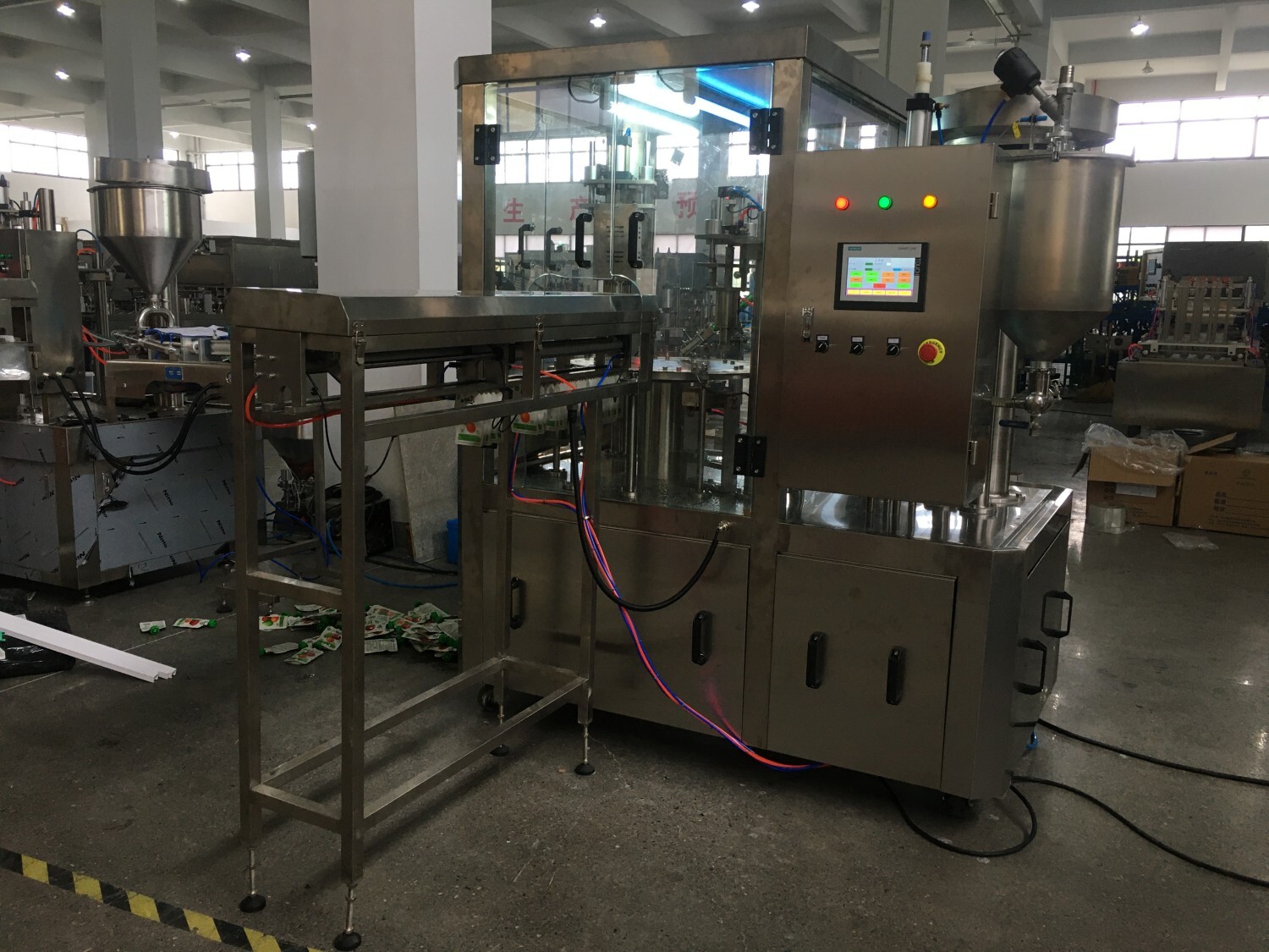 Automatic Juice Milk Doypack Feeding Filling Capping Machine Bags Collecting
